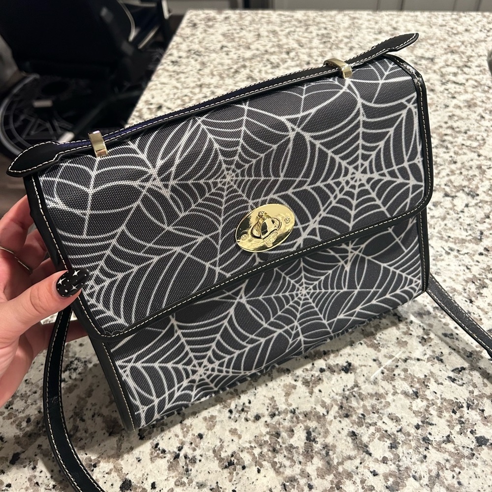 Spider web purse